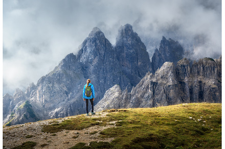 Female hiker admiring Dolomites