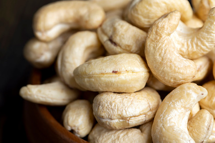 Hard roasted and peeled cashew nuts on the table, a Photo by MyPhotos
