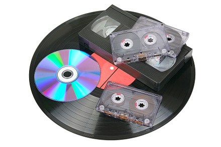 Vinyl disc, audio and video cassettes, a Technology Photo by Serg64