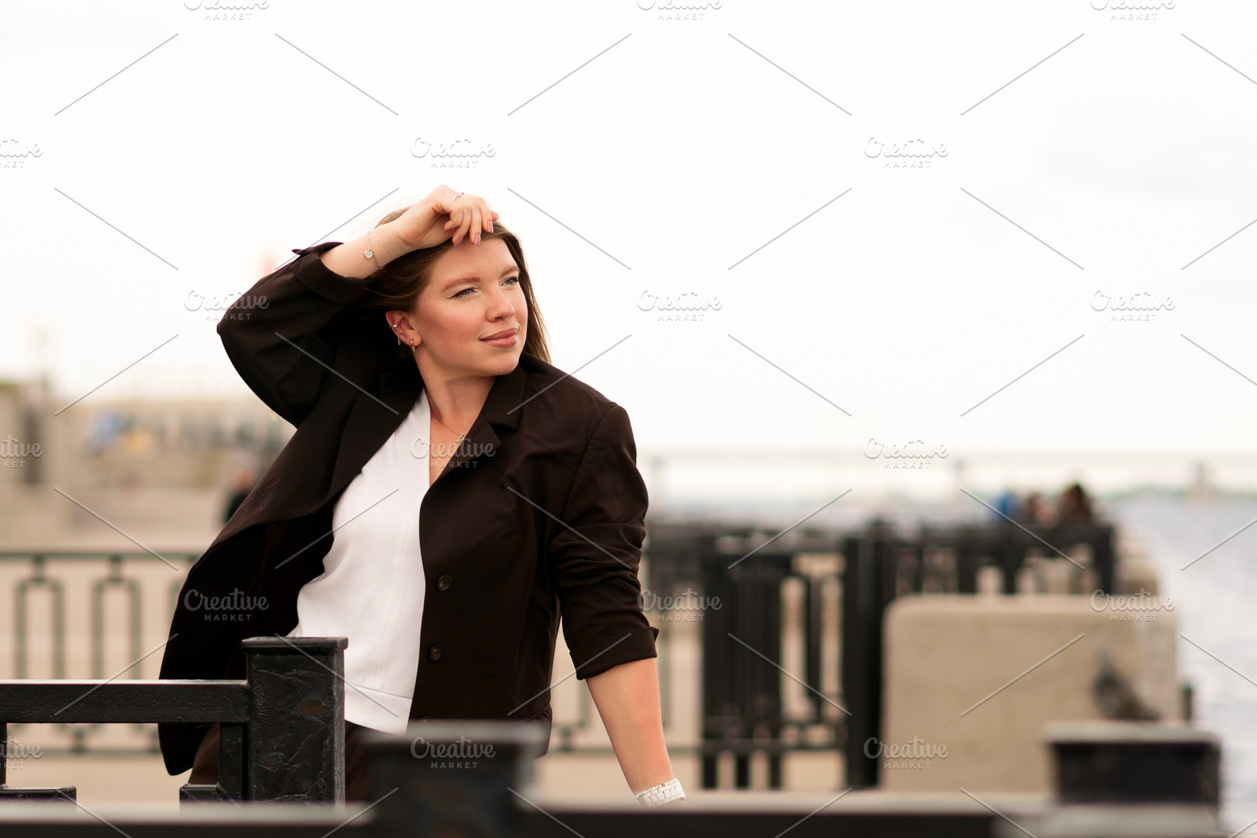Woman in brown blazer posing, a Person Photo by Elena Vagengeim