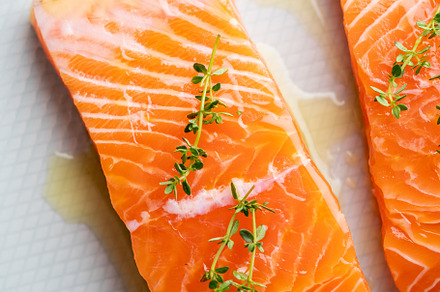 Fresh salmon fillet on a plate for delicious salmon steak.