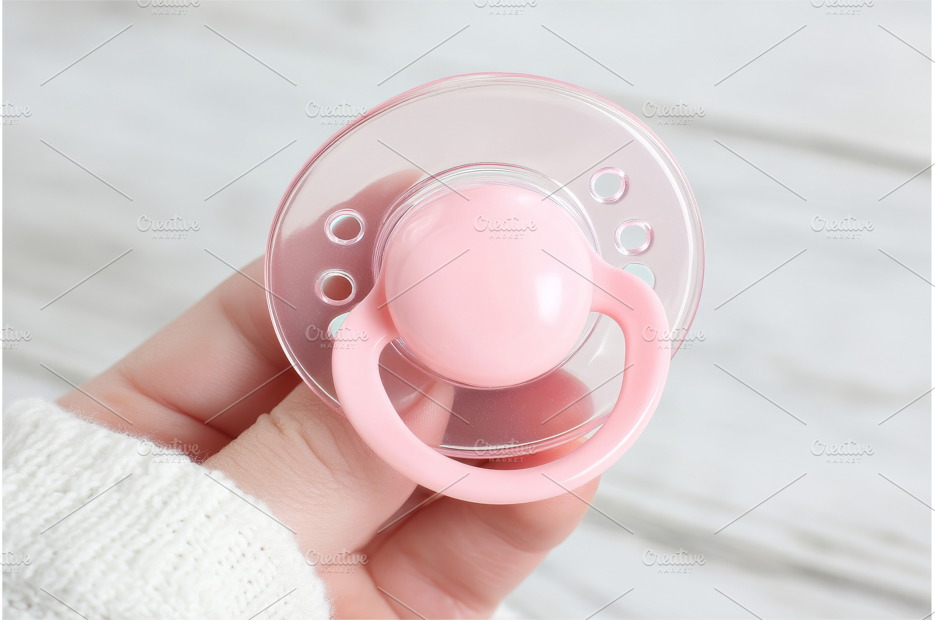 A close-up shot features baby hands, a Person Photo by ZinetroN