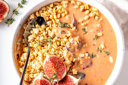 Healthy breakfast bowl with granola and figs, a Food & Drink Photo by Rimma