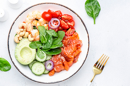Keto salad with spinach, salmon, shrimp, avocado, cucumber, toma, a Food & Drink Photo by 5PH
