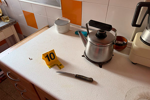 Knife and evidence marker 10 at crime scene