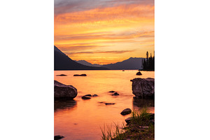 Vibrant sunset over Lake Wenatchee, a Nature Photo by Backyard Stock