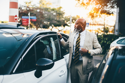 Black Man on the Go to His Car, a Person Photo by SkyNext