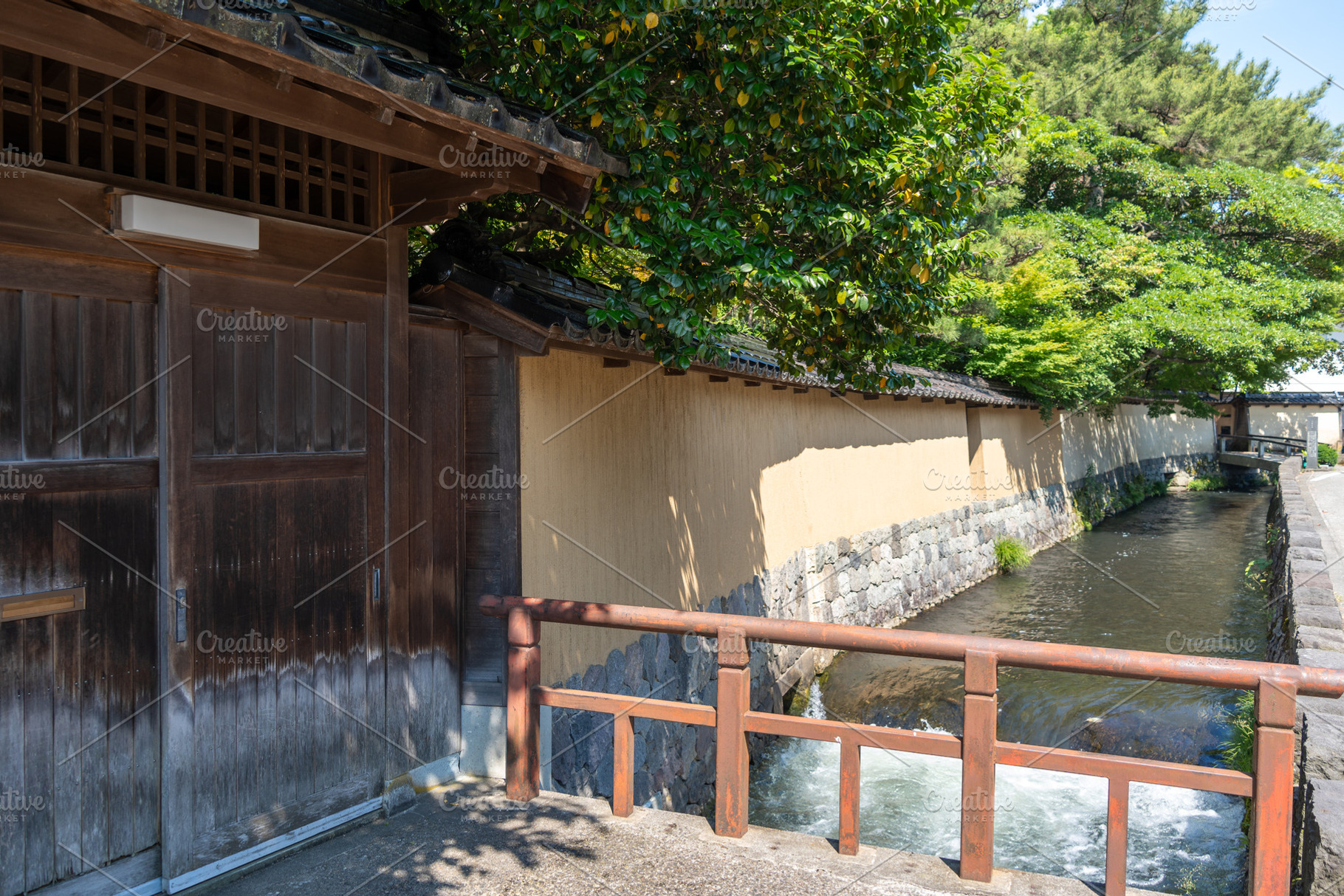 Traditional street with canal in Nagamachi District, Kanazawa, J, an Architecture Photo by GoodGoods