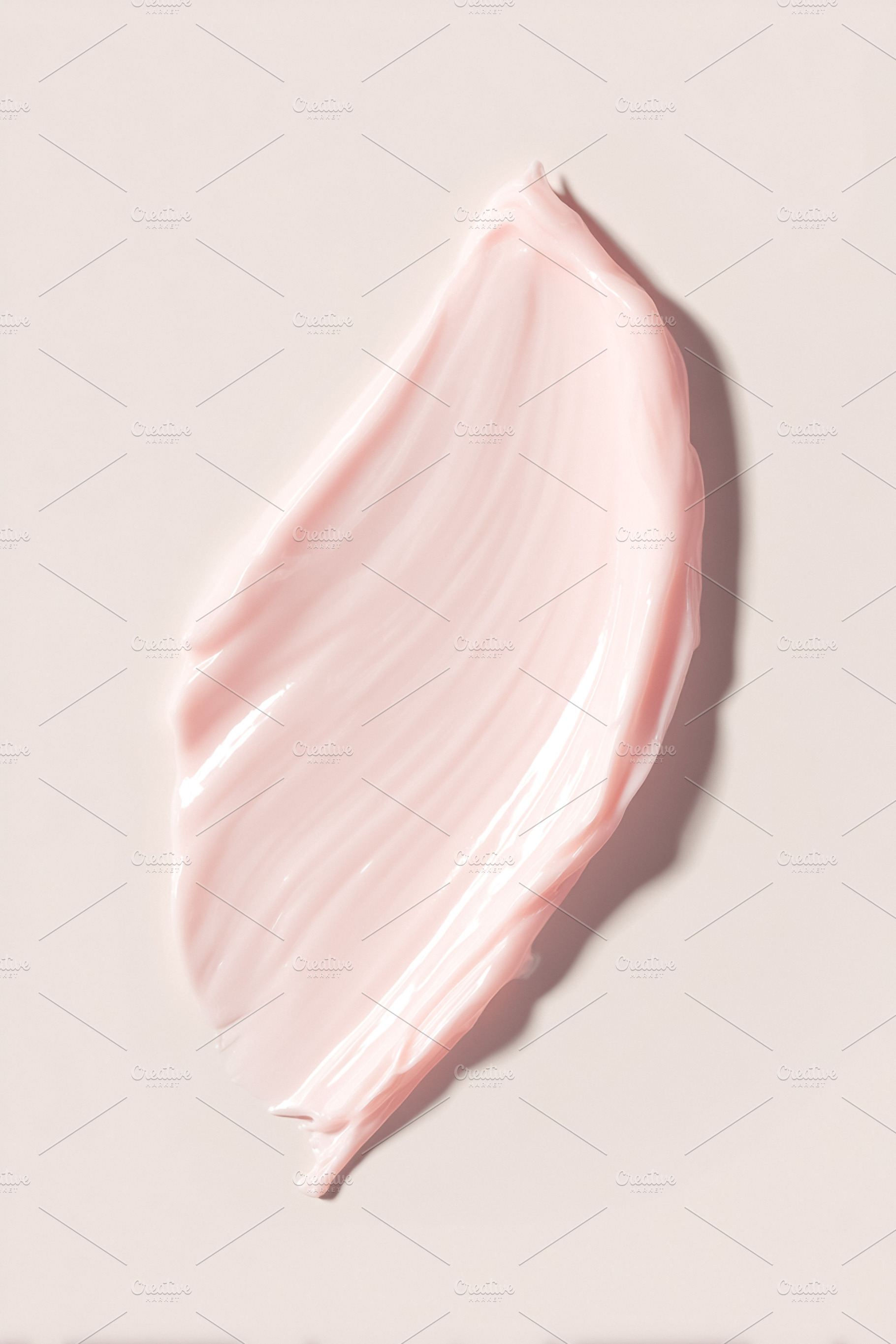 Creamy pink cosmetic product smear on a light background, highli, a Photo by Studio ANNA