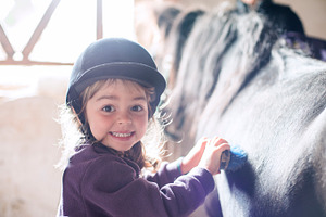 Little girl with horse