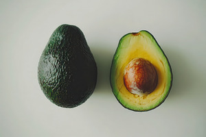 Textures of a whole avocado, a Photo by Pavel_design