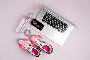 Laptop, sneakers and water bottle