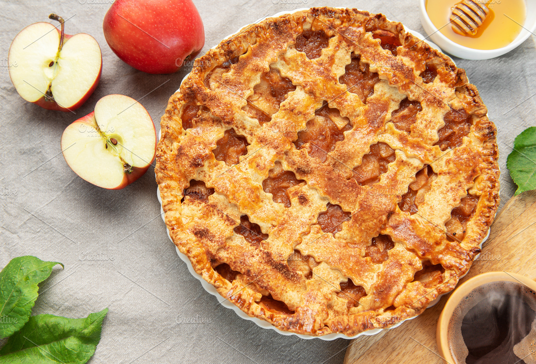 Delicious homemade apple pie with honey and coffee enjoyed durin, a Food & Drink Photo by Olena Rudo