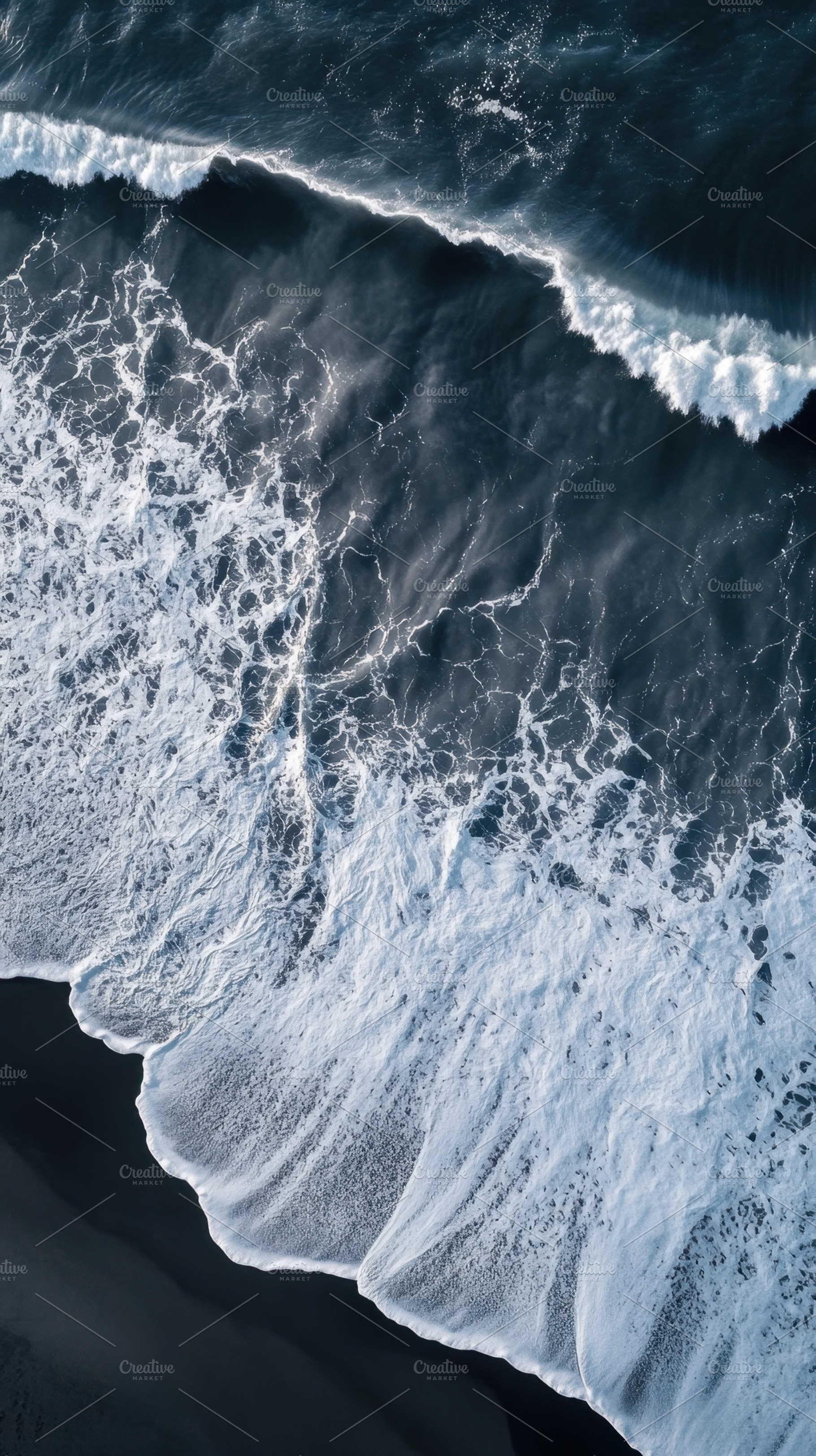 Waves crashing on dark sandy shore, a Photo by Beautiful things