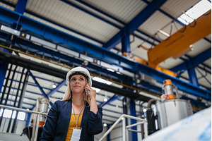 Female engineer or technician making, an Industrial Photo by HalfPoint