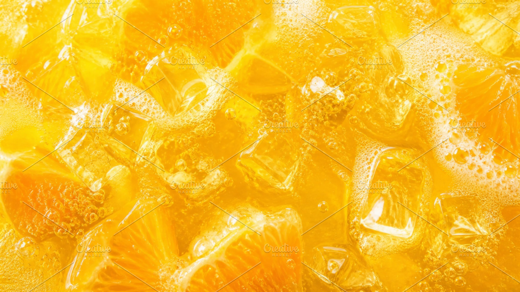 Orange juice with ice and bubbles as, a Photo by Dvoevnore photos