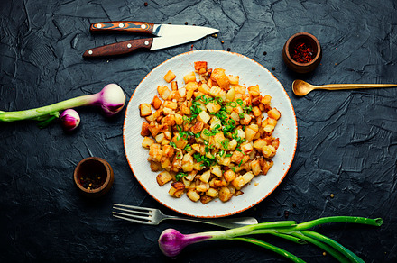 Fried potatoes with green onions, a Food & Drink Photo by MLunov MLunov