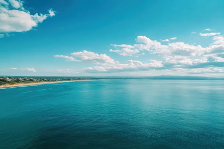 Serene views of blue sky and calm se, a Photo by Iftikhar Alam