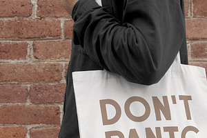 Man With White Tote Bag