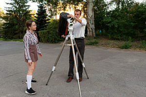 Man adjusting telescope during outdo, a School & Education Photo by Elena Vagengeim