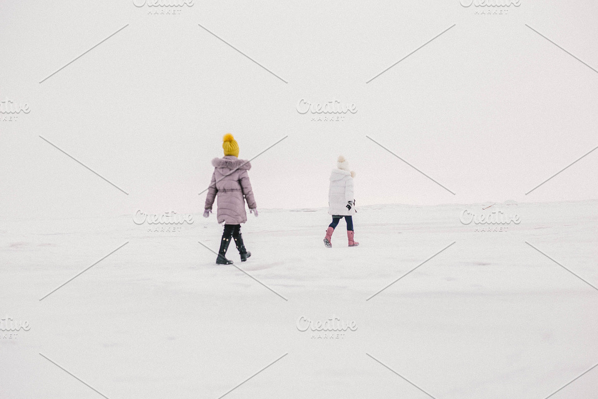 two girls walk on the frozen sea, a Person Photo by Viktoriya Isaeva (Photo 2 of 2)