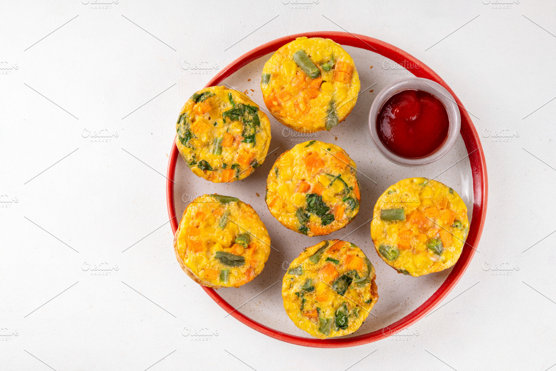 Loaded egg bites with spring vegetables, a Food & Drink Photo by Rimma
