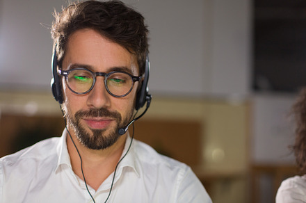 Front view of call center operator stock photo containing dark and concept