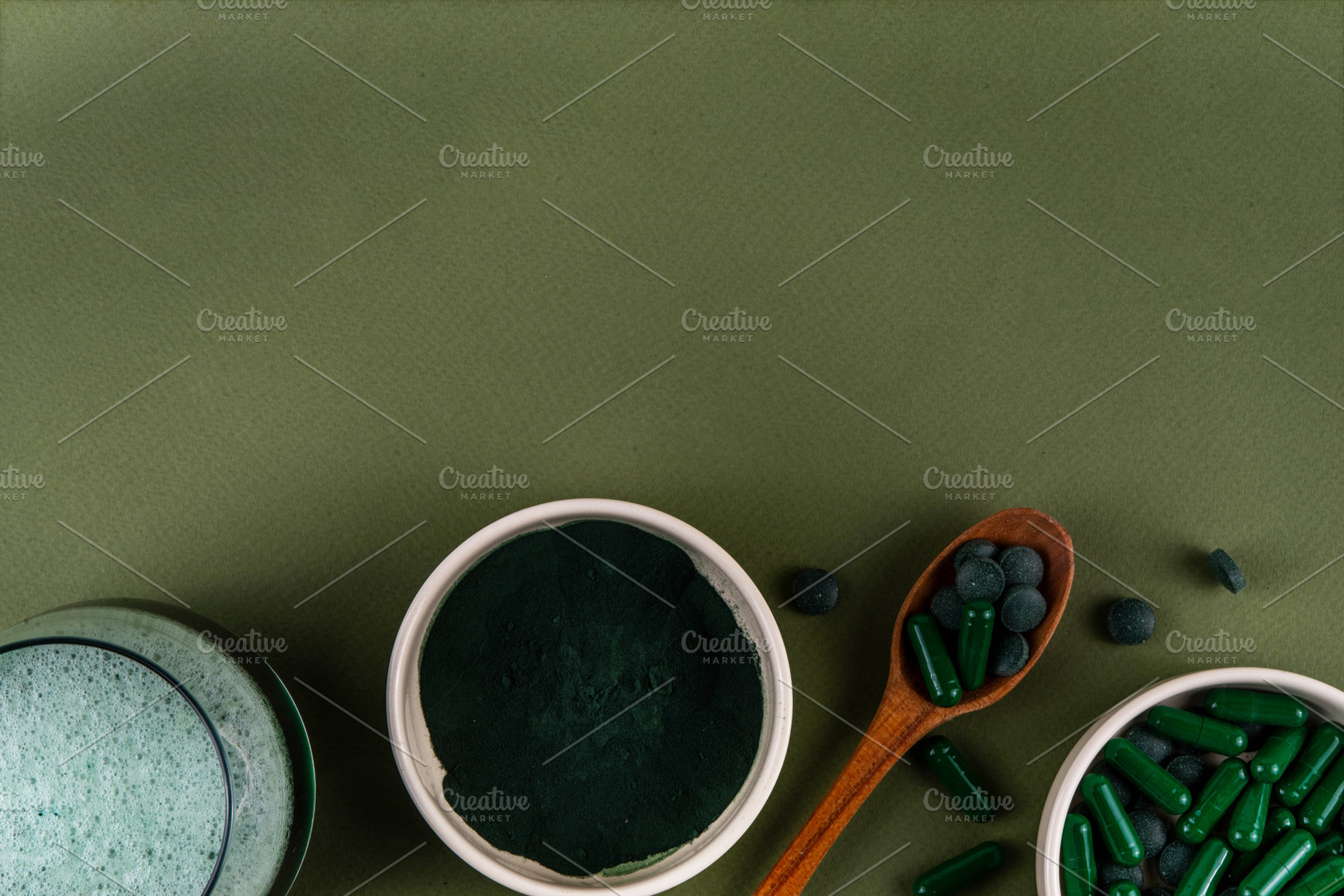 Spirulina in powder, capsules and tablets with spirulina smoothi, a Health & Medical Photo by Rimma