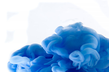 Blue clouds of ink in liquid isolated on white, an Abstract Photo by eleana