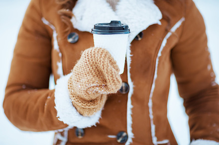 Closeup on female outdoors in city park in winter, a Person Photo by Alliance Images