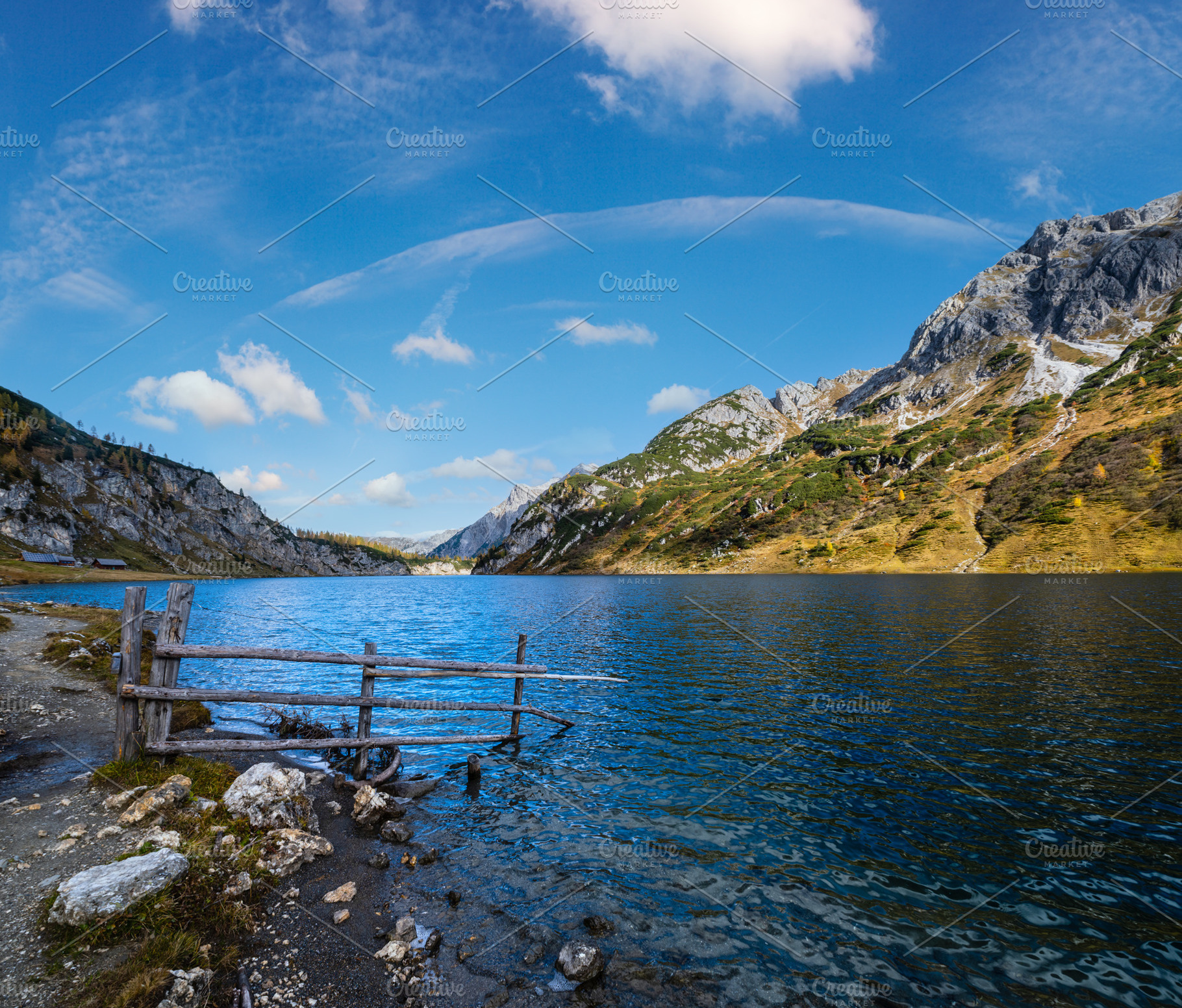 Sunny autumn alpine Tappenkarsee lake and rocky mountains above,, a Nature Photo by YuriyB