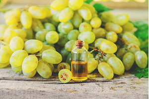 Grape seed oil in a bottle, a Food & Drink Photo by yanadjana