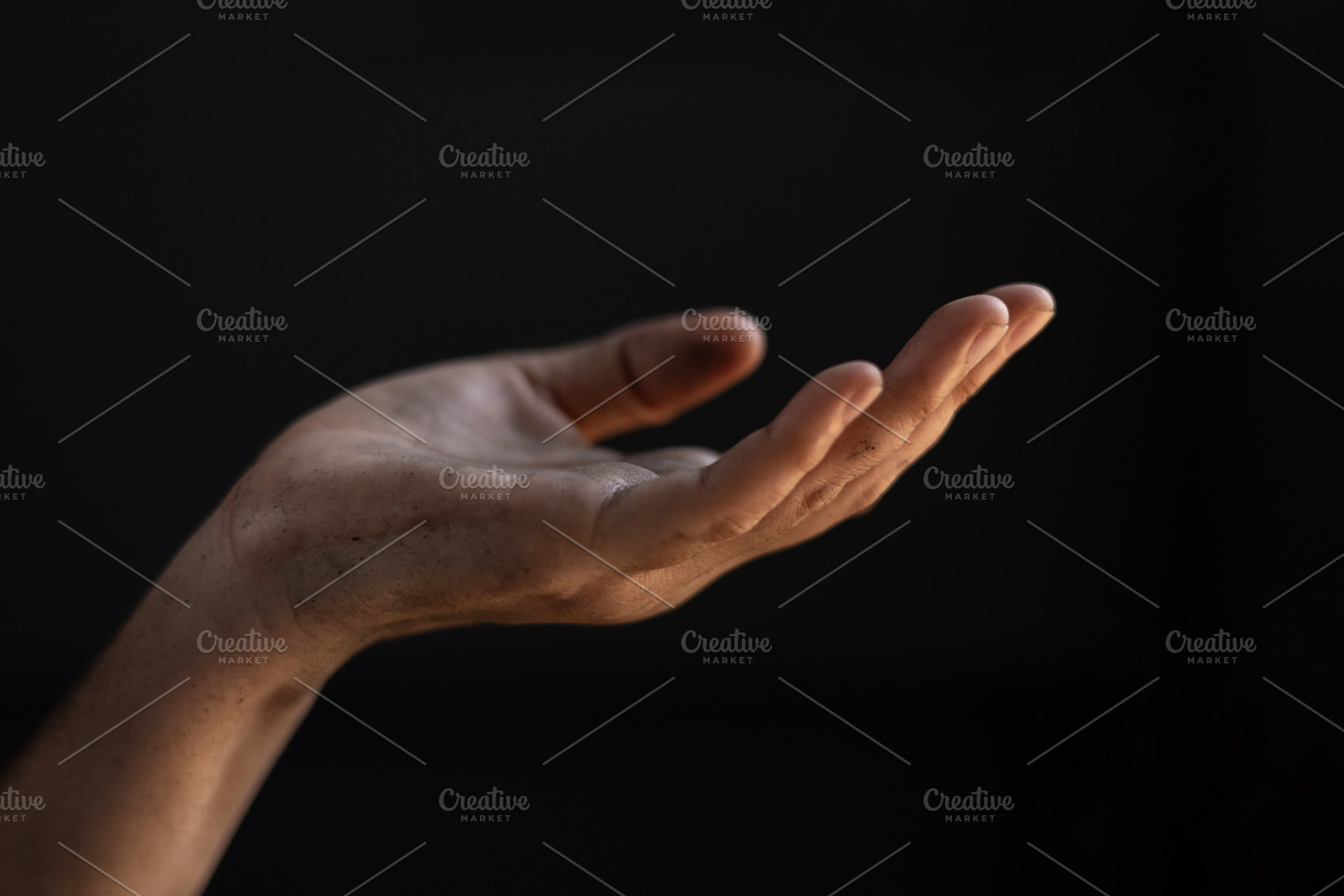 Dirty hand in begging gesture. Poverty and humanitarian crisis, a Photo by salmon.black