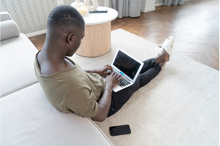 Young afroamerican man working with, a Person Photo by Neirfy
