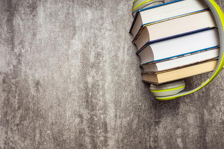 Pile of books with headphones stock photo containing concept and book, a Technology Photo by photoWorkshop
