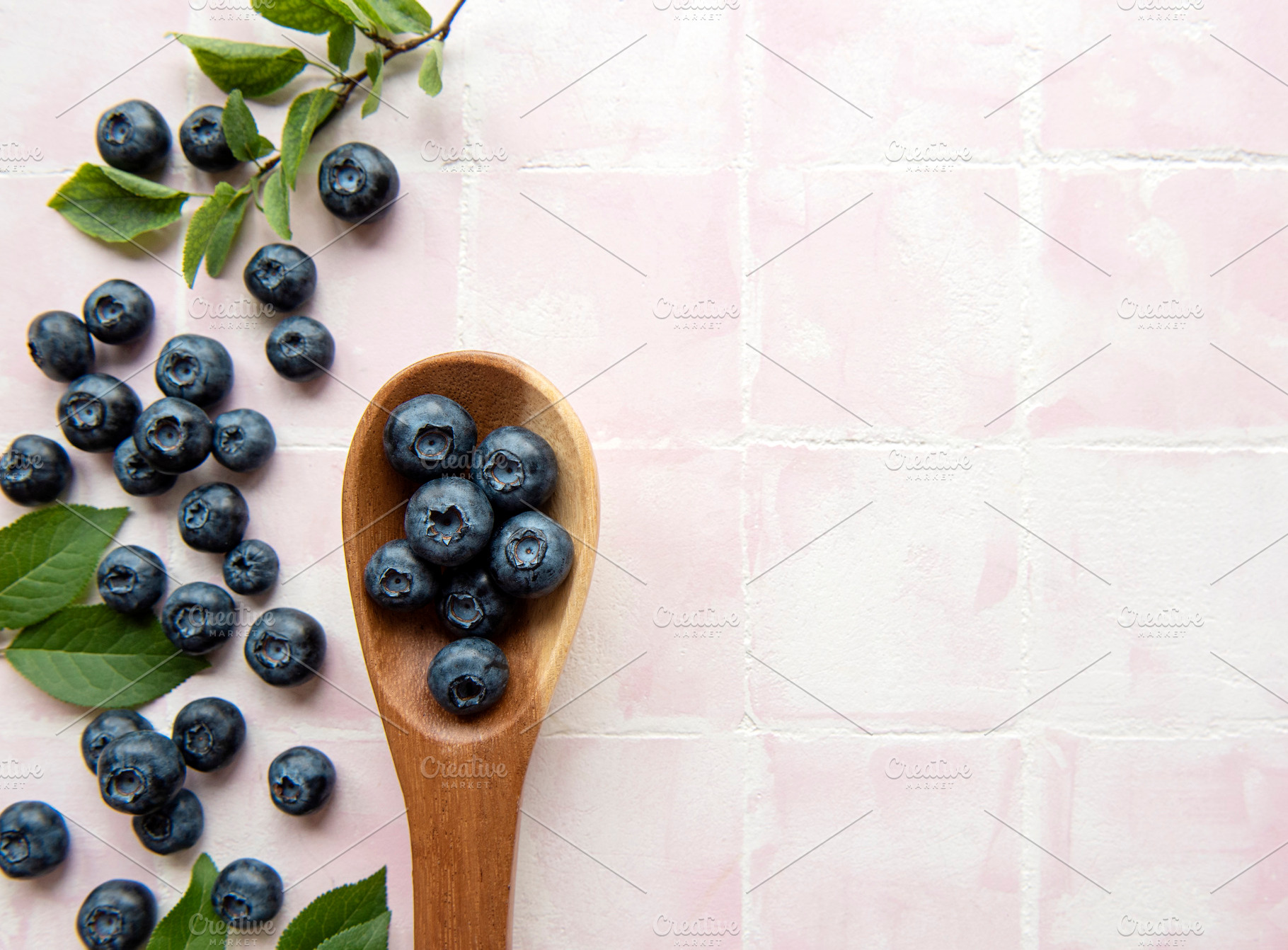 Blueberries on tile background, a Food & Drink Photo by Olena Rudo