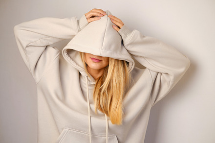 Young beautiful girl in white hoodie, a Person Photo by Iuliia Pilipeichenko