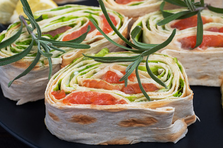 Rolls of pita bread and red salmon, a Food & Drink Photo by Elenglush