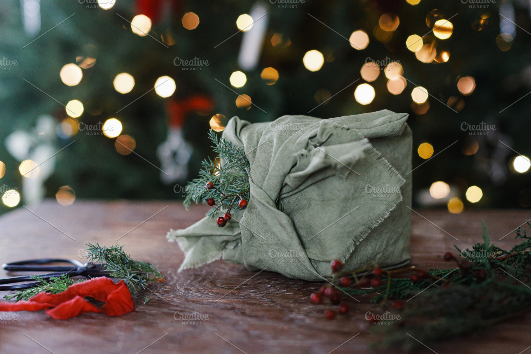 Merry Christmas! Stylish christmas present wrapped in fabric wit, a Holiday Photo by Sonjachni