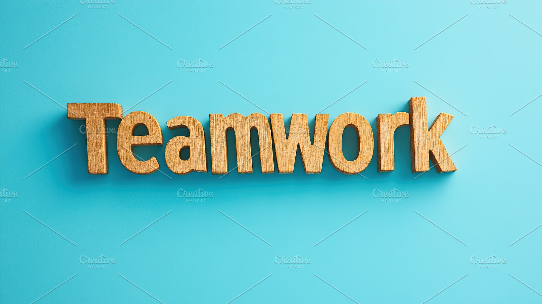 Word Teamwork by wooden letters on blue background, a Business Photo by AlyaAnd