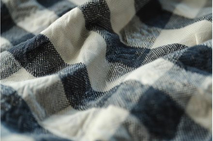 Textured blue and white checked, a Background Photo by Ylivdesign