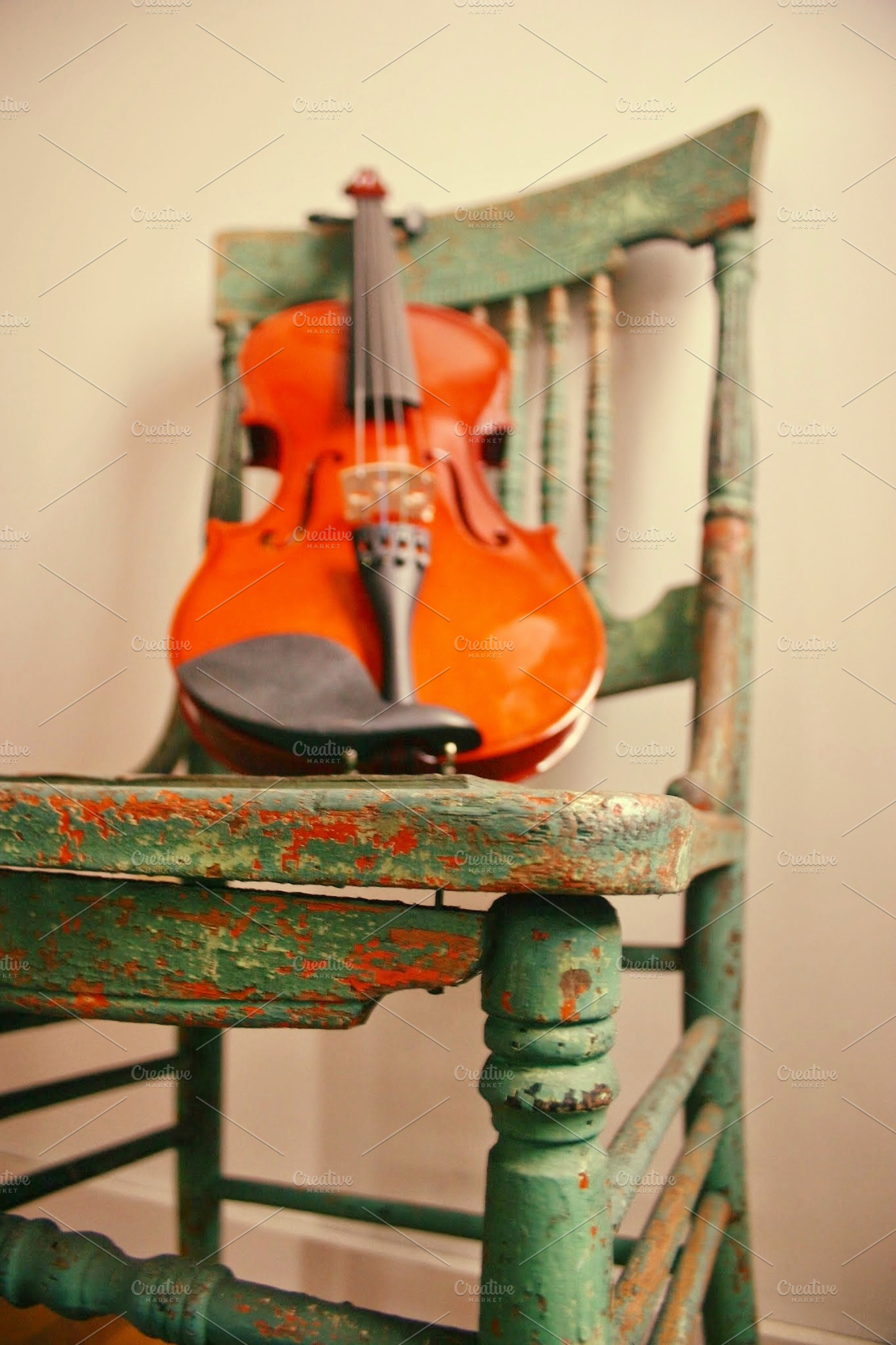 Fiddle on chair containing fiddle, violin, and rustic, an Arts & Entertainment Photo by Shop Worth