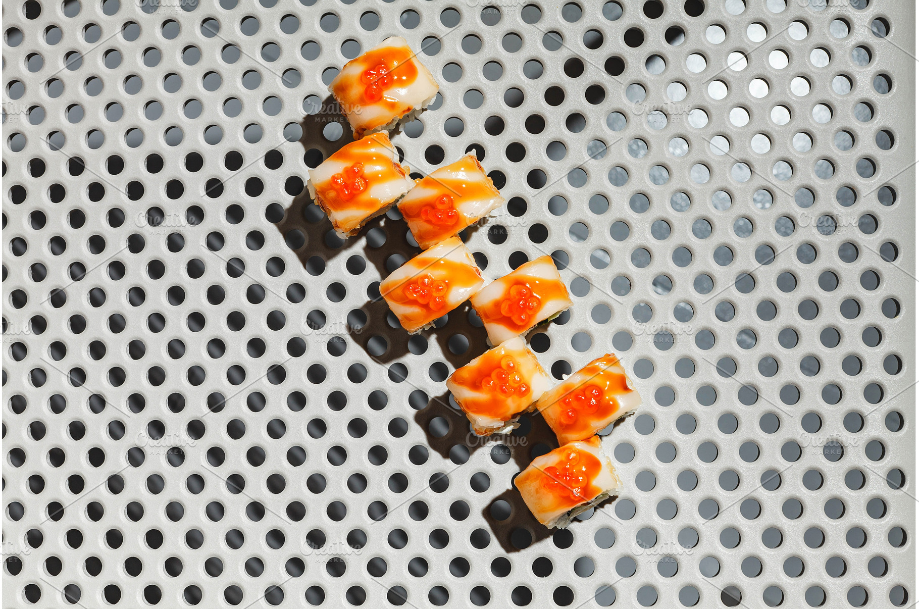 Sushi rolls with eel, shrimp, a Food & Drink Photo by Irina Burakova