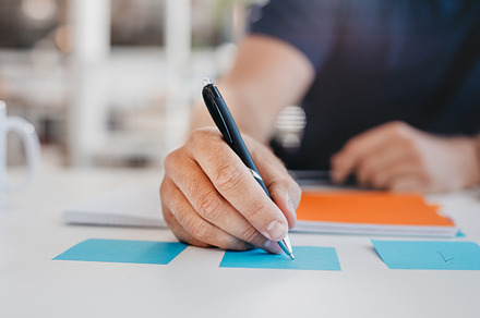 Business man writing, a Business Photo by Jacob Lund