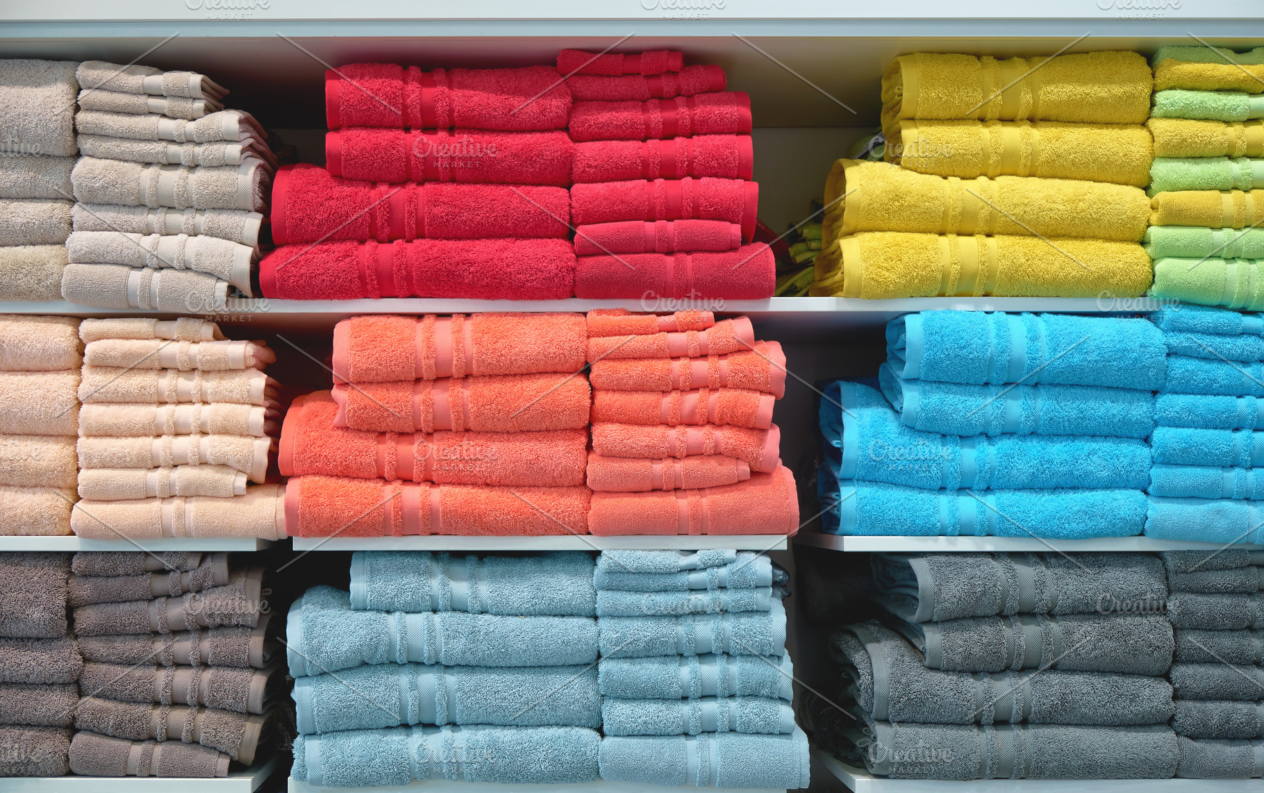 Bathing towels on shelf in shop, a Beauty & Fashion Photo by BOOCYS