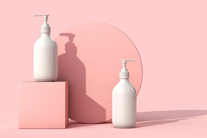 Blank cosmetic bottles on pink containing cosmetic, bottle, and beauty