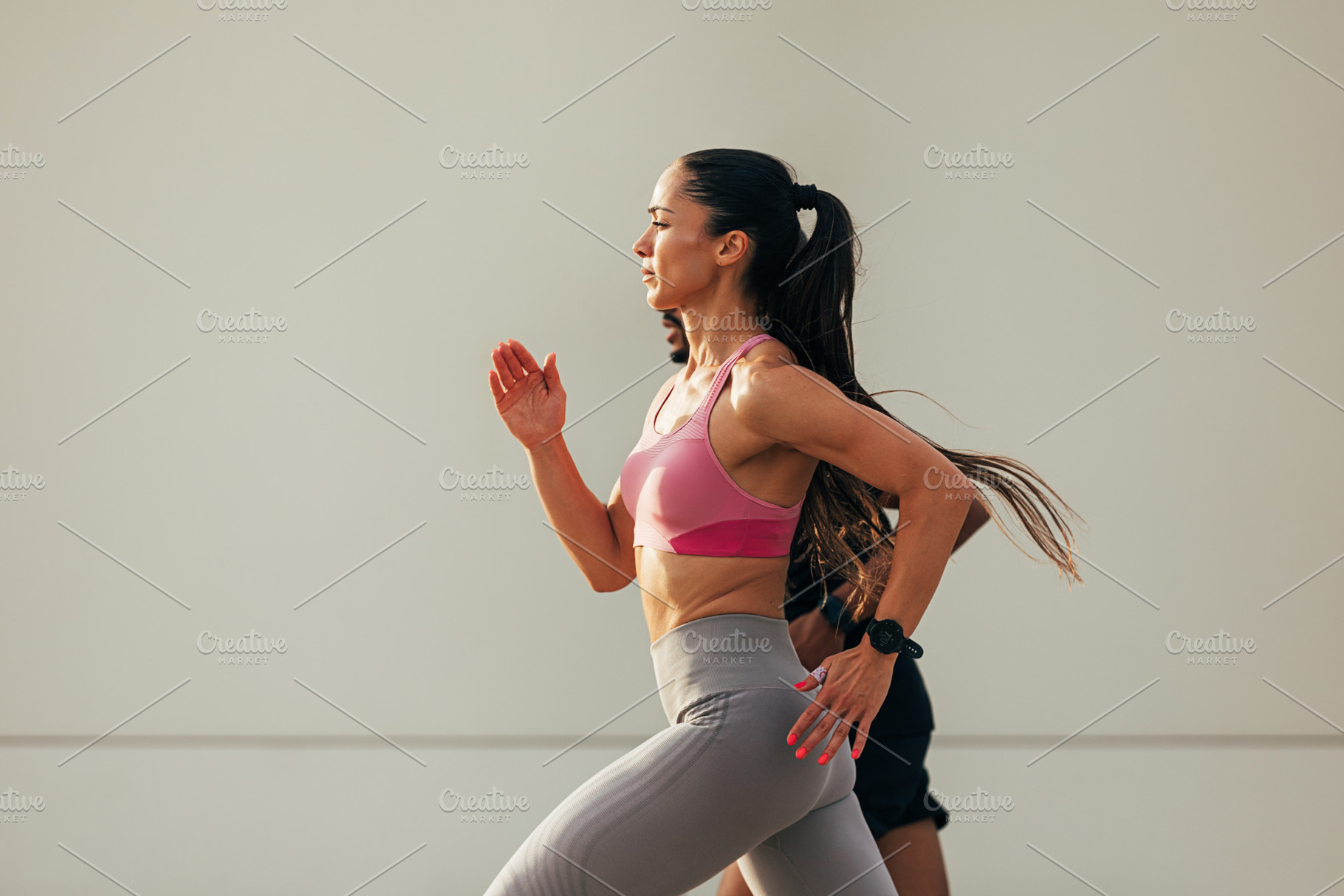 Side view of young woman runner, a Sports & Recreation Photo by Artem Varnitsin