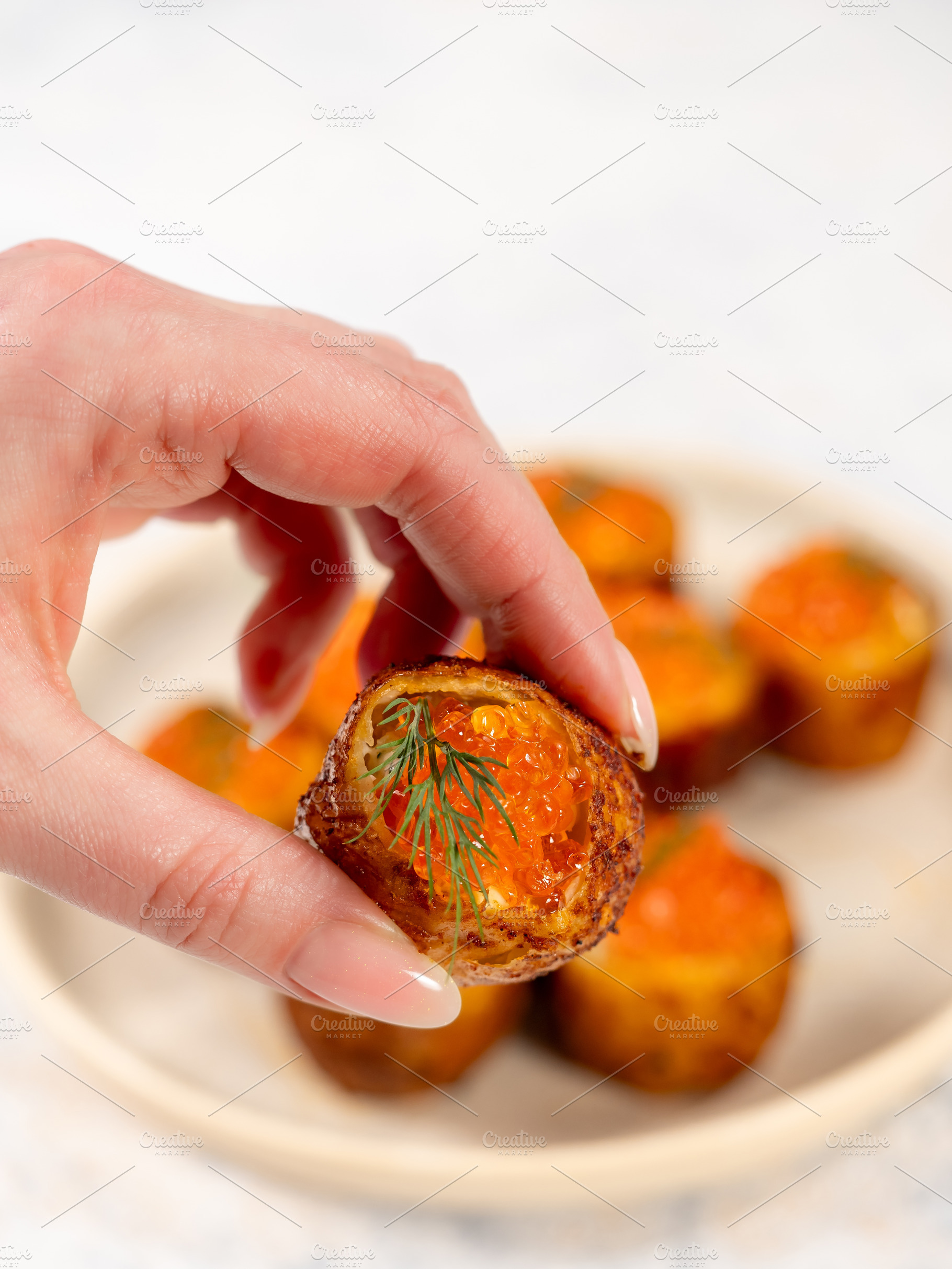 Close-Up of Potato Bites with Caviar, a Food & Drink Photo by Fascinadora