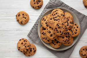 Homemade Chocolate Chip Cookies on a Plate, top view., a Food & Drink Photo by LiudmylaChuhunova