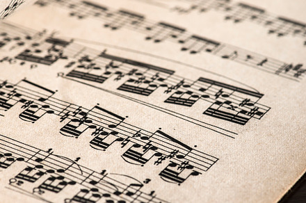 Music notation book containing music, notes, and sheet